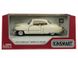 Іграшкова металева машинка Kinsmart Cadillac Series 62 Coupe 1953 білий KT5339WW фото 4