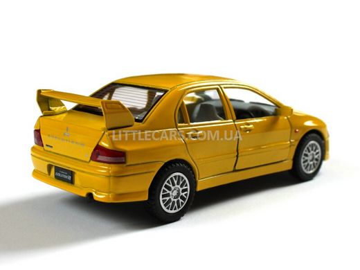 Іграшкова металева машинка Kinsmart Mitsubishi Lancer Evolution VII жовтий KT5052WY фото