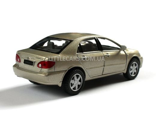 Іграшкова металева машинка Kinsmart Toyota Corolla світло-коричневая KT5099WBG фото